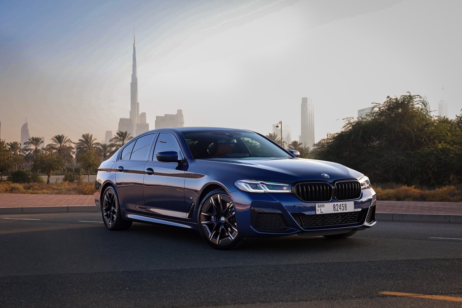 BMW 530i M Package blue front three-quarter view
