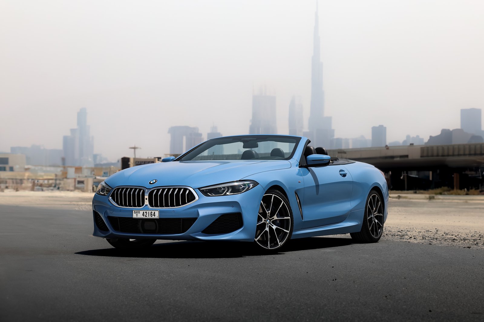 BMW 840i Cabrio blue front three-quarter view
