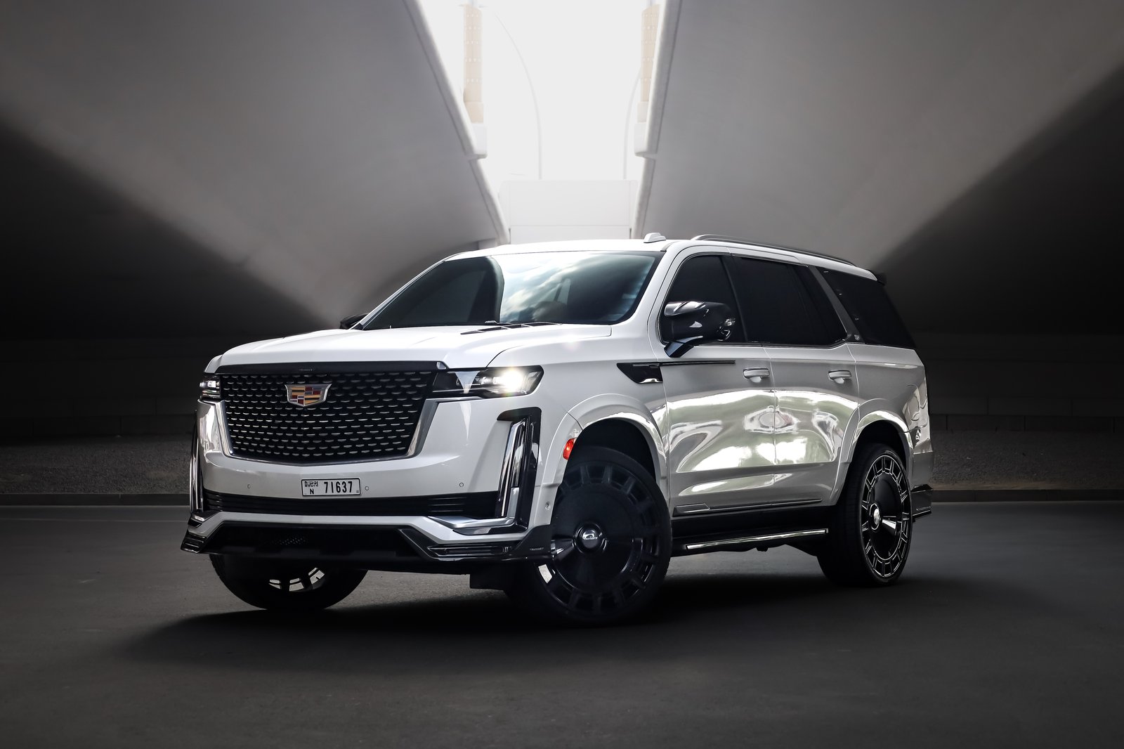 Cadillac Escalade Mansory white front three-quarter view