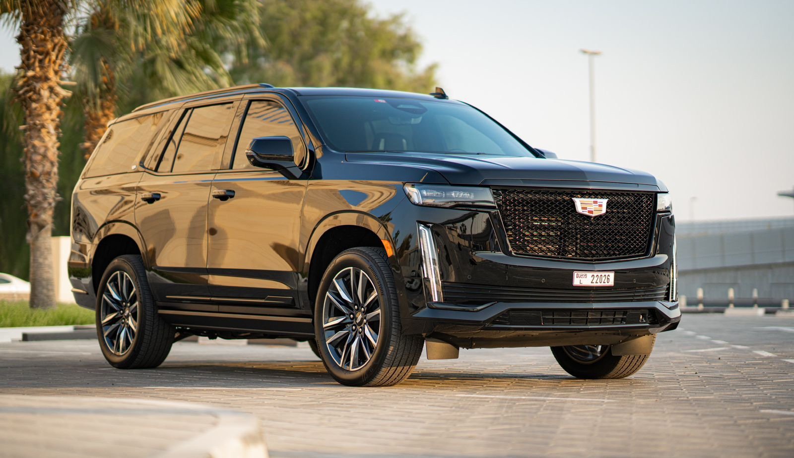 Cadillac Escalade Platinum Sport black front view