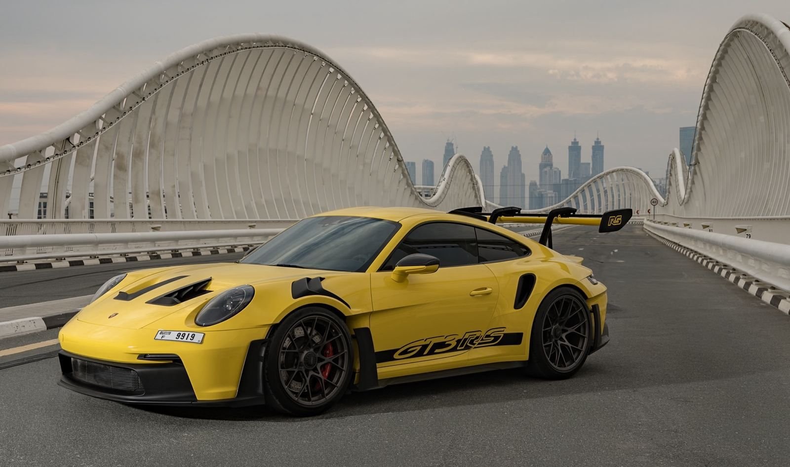 Porsche 911 GT3 RS yellow front three-quarter view