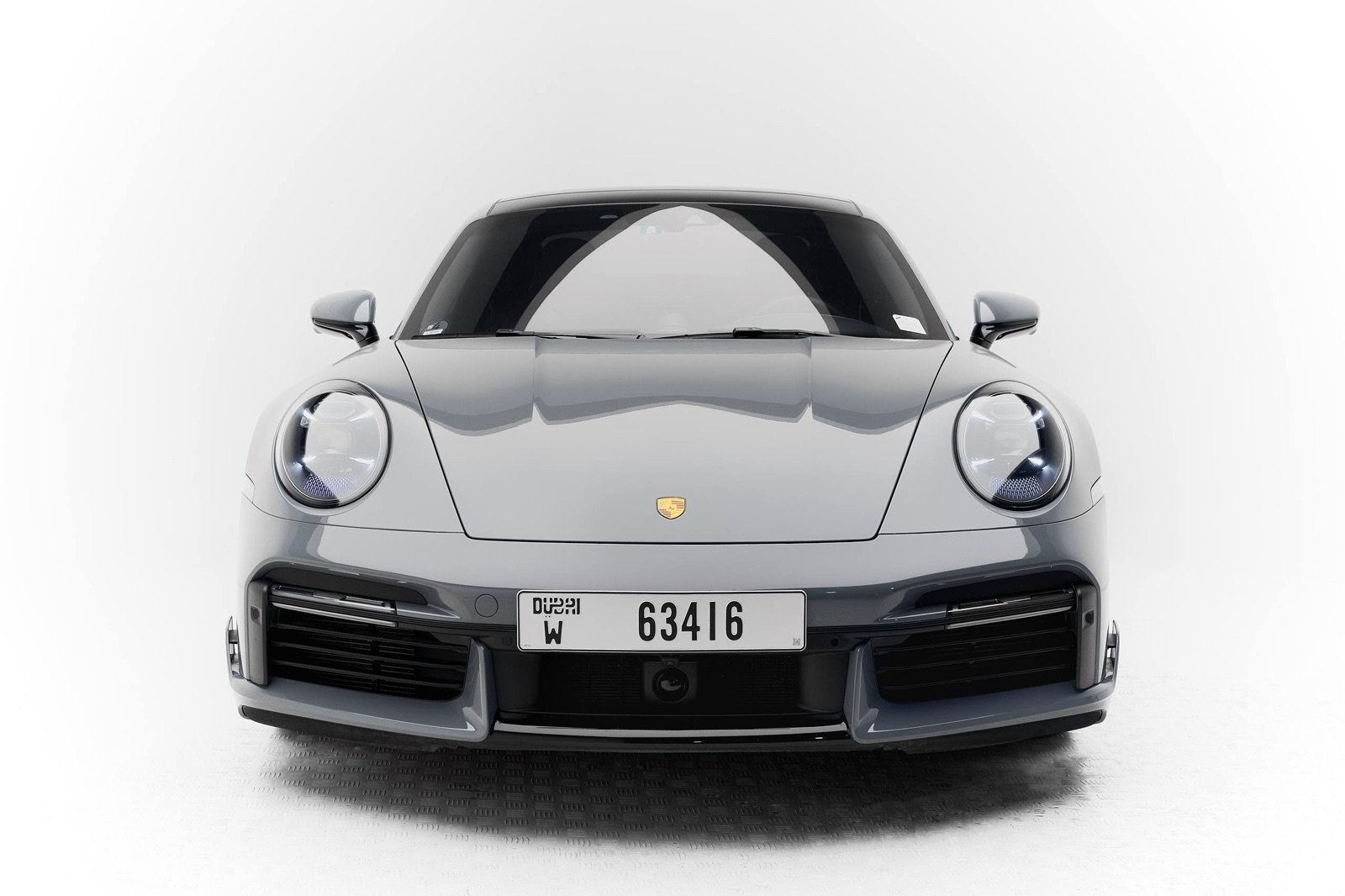Porsche 911 Turbo S grey front view